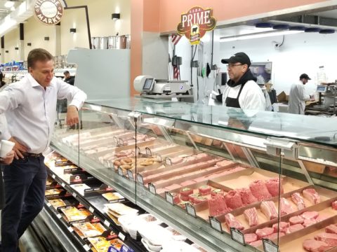 President Brian String visiting a Village Supermarket.
