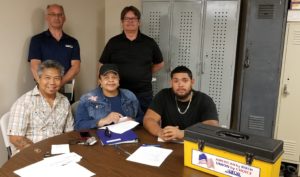 Taylor Provisions Negotiating Committee. Top Row: Union Representative Jerry Chudoff, Director of Collective Bargaining Larry Lucente. Bottom Row: Clayde Arago, Sheila Brown, and Christopher Cruz