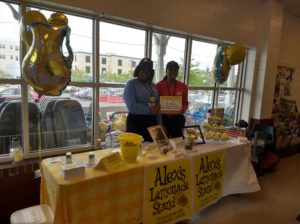 Patti's coworkers running the stand.