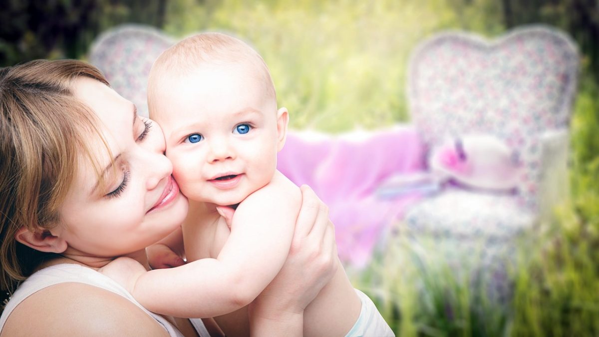 A mother holding her child