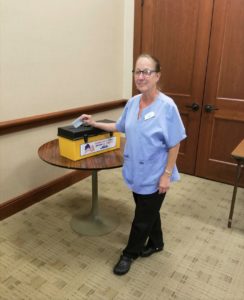A Meadow Lakes member voting on the contract