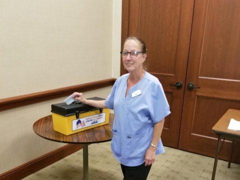 A Meadow Lakes member voting on the contract