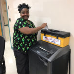 A UFCW Local 152 member voting at Bacharach's ratification meeting.