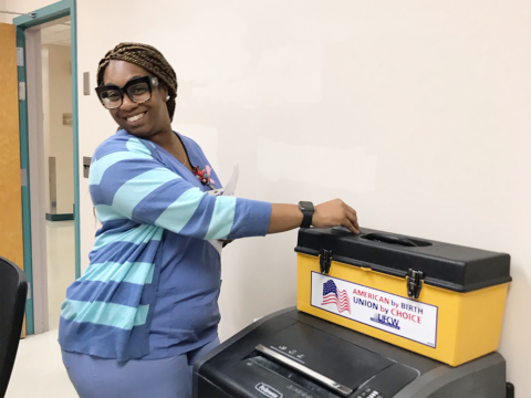 A UFCW Local 152 member voting at Bacharach's ratification meeting.