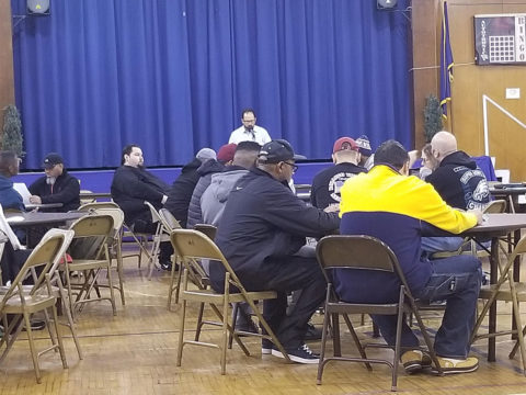 Members of Dietz and Watson Logistics learning about the new contract to vote.