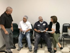 Members of TQ Baking learning what the contract is about.
