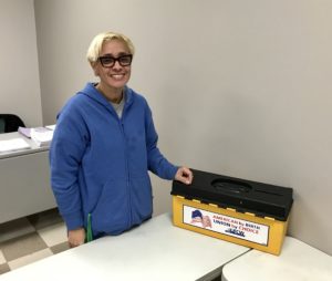 A TQ Baking member casting a vote at the contract ratification meeting on 10/23/2019.