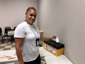 A TQ Baking member casting a vote at the contract ratification meeting on 10/23/2019.
