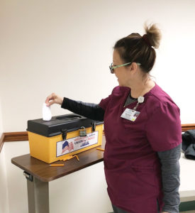 A UFCW Local 152 member from Cape Regional Medical Center voting on the 2020 contract.