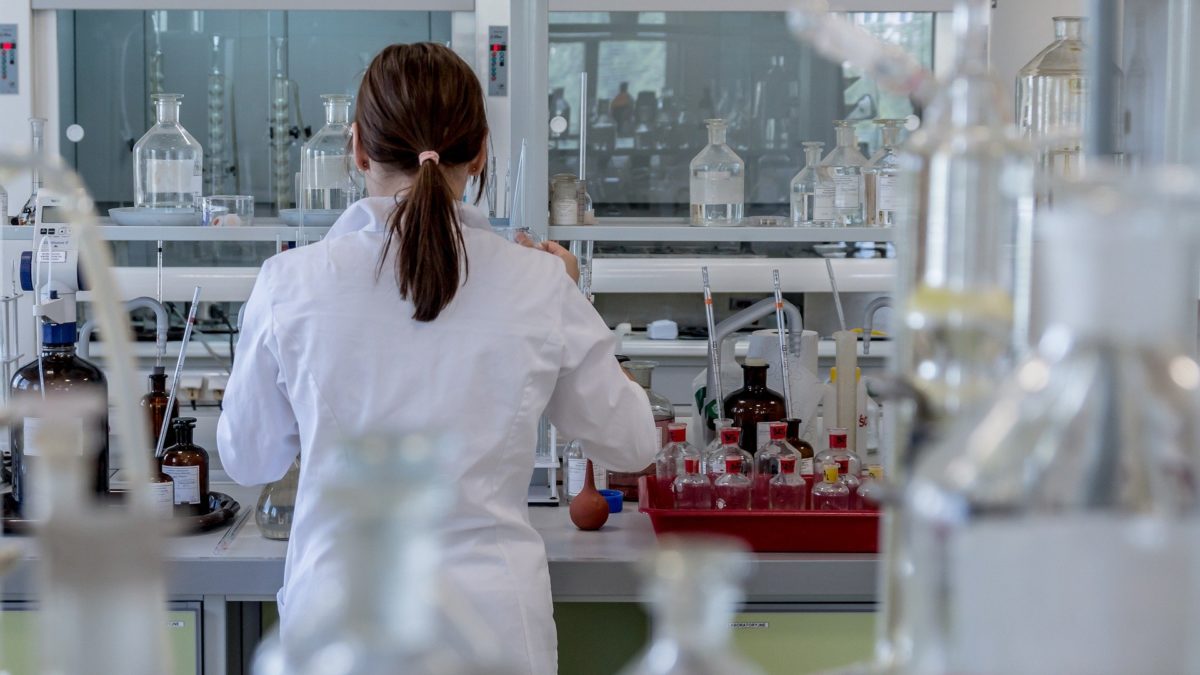 A woman working in a laboratory.