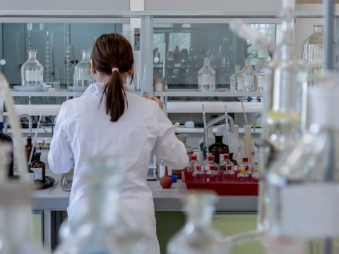A woman working in a laboratory.