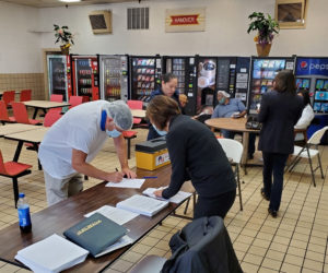 A member voting at the Hanover Foods ratification meeting on 6/17/2020.