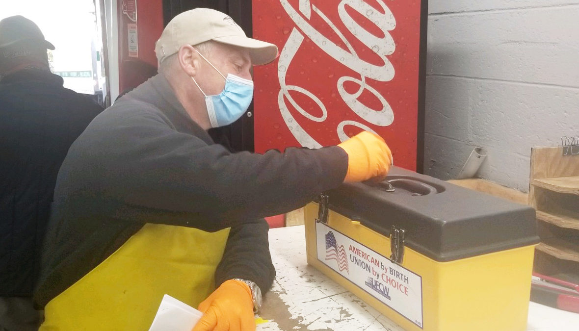 A UFCW Local 152 member voting at the Lawrence Street Seafood ratification on 7/14/2020.