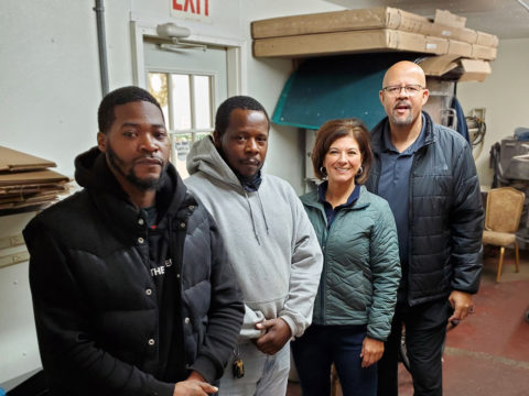 The Negotiating Committee: Committeeperson Vincent Freeman, Chief Shop Steward Fred Drayton, Assistant Director of Collective Bargaining Lisa Sanders, and Union Representative Greg Torian.