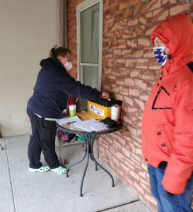 A member at UMC at Bristol Glen voting on the contract.