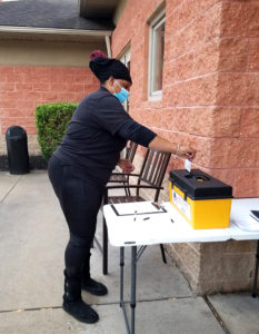 A member voting at the Spring Oak of Berlin ratification meeting on 3/12/2021.
