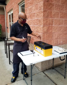 A member voting at the Spring Oak of Berlin ratification meeting on 3/12/2021.