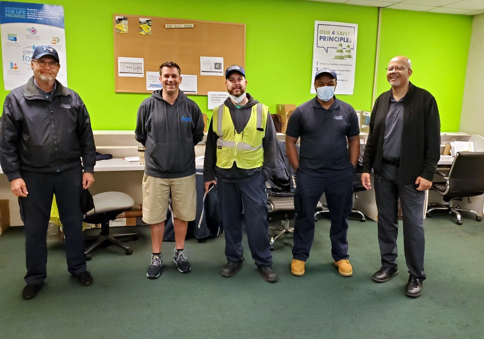 Members at the DS Services ratification meeting on March 26 with their Union Representative Greg Torian (far right).