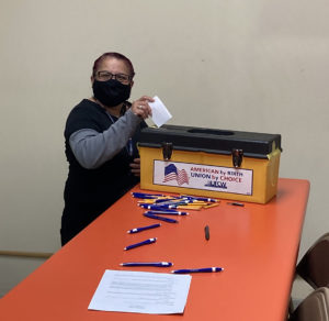 A member voting at the Kunzler & Company ratification in 2021.