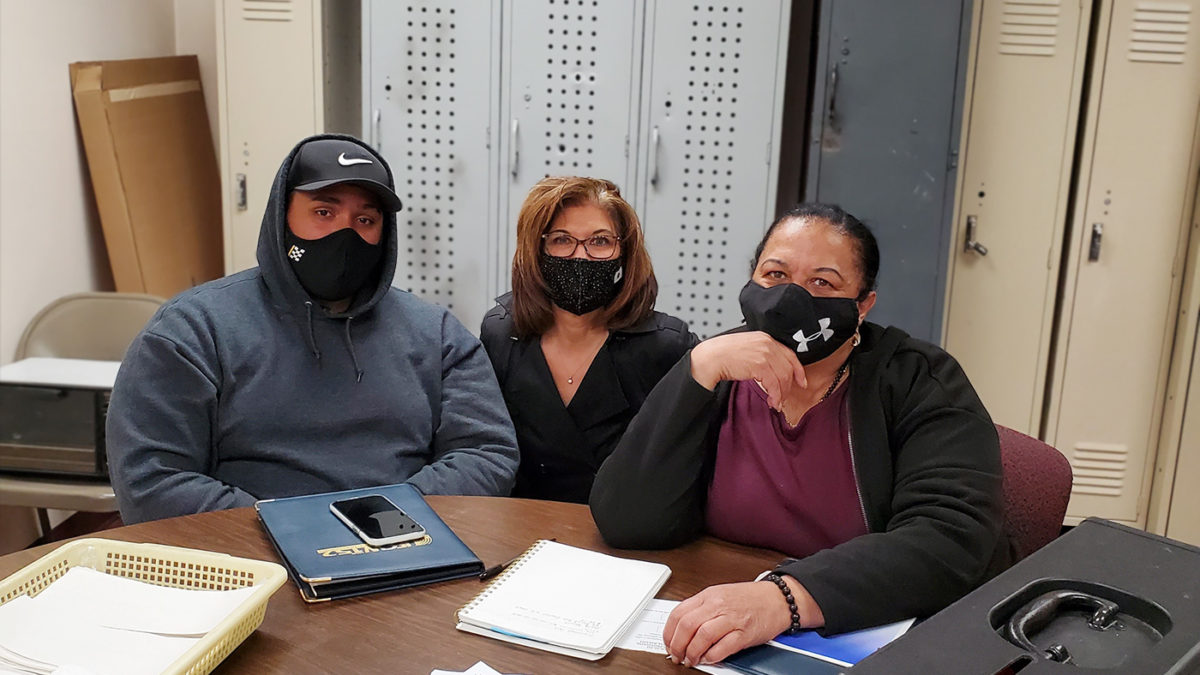 Part of the Negotiating Committee at Taylor Provisions 2021. From left to right: Committeeperson Christopher Cruz, Assistant Director of Collective Bargaining Lisa Sanders, and Shop Steward Sheila Dean.