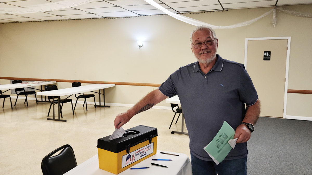 A member casting his vote at the ShopRite Meat ratification meeting.