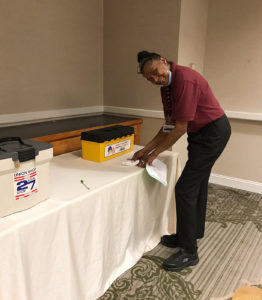 A member casting her vote at the ShopRite Meat ratification meeting.