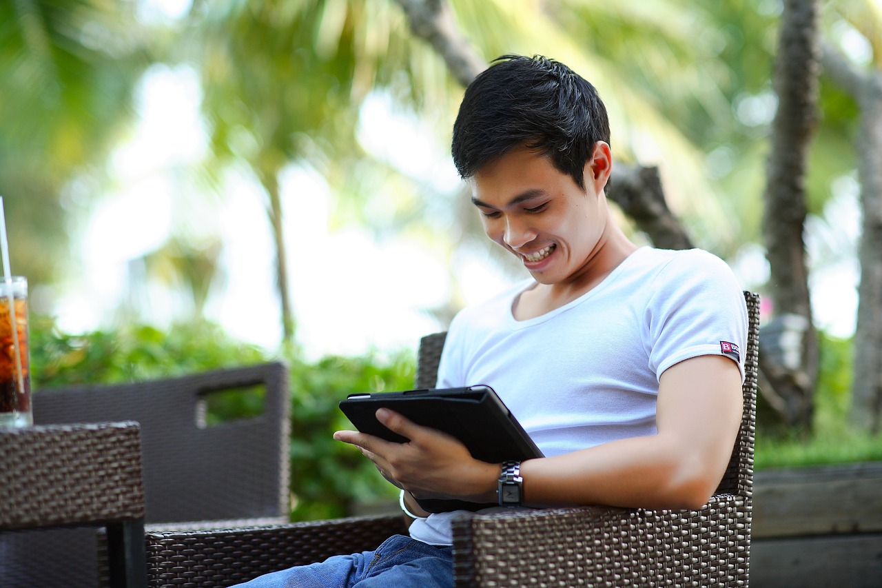 A young man on a tablet A young man on a tablet