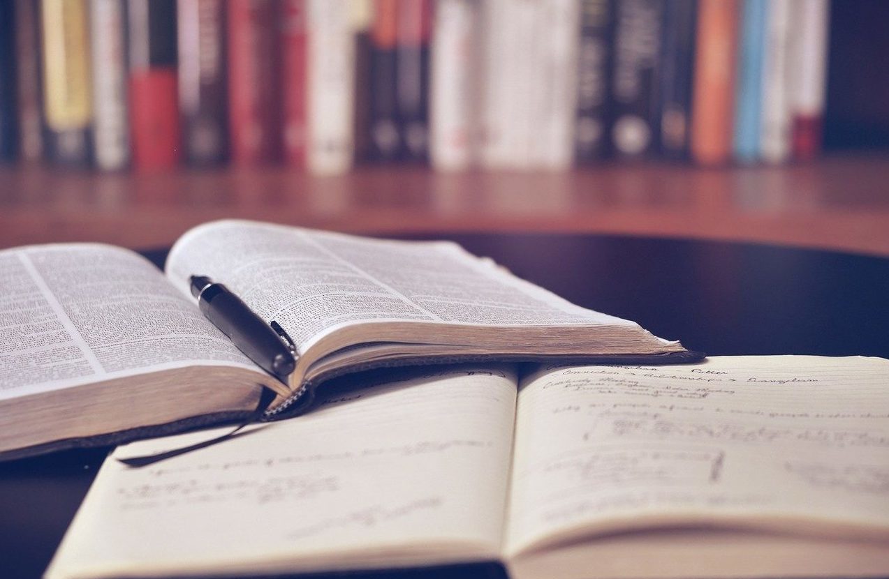 Books open on a desk Books open on a desk
