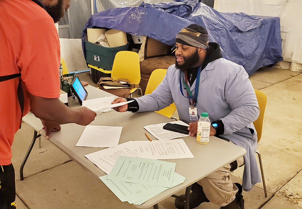 Steward Antonio Fontanez and Committee member Tuon Tran tallying ballots.