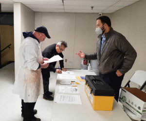 Members voting at the ratification meeting on 12/20/2021.