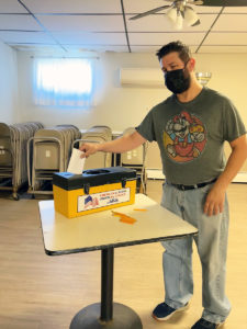 A member voting at the Barry Callebaut ratification meeting on 1/26/22.