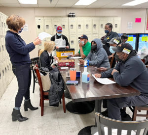 Workers at Brown's/Fresh Grocer learning about the new contract, 2/2/2022.