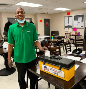 A member casting his vote, 2/2/2022.