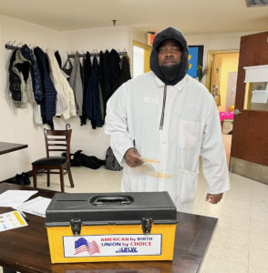 A member casting his vote, 2/2/2022.
