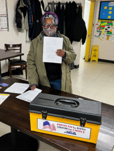 The Shop Steward of Fresh Grocer on Monument Road with the new union contract, 2/2/2022.