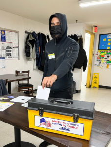 A member casting his vote, 2/2/2022.
