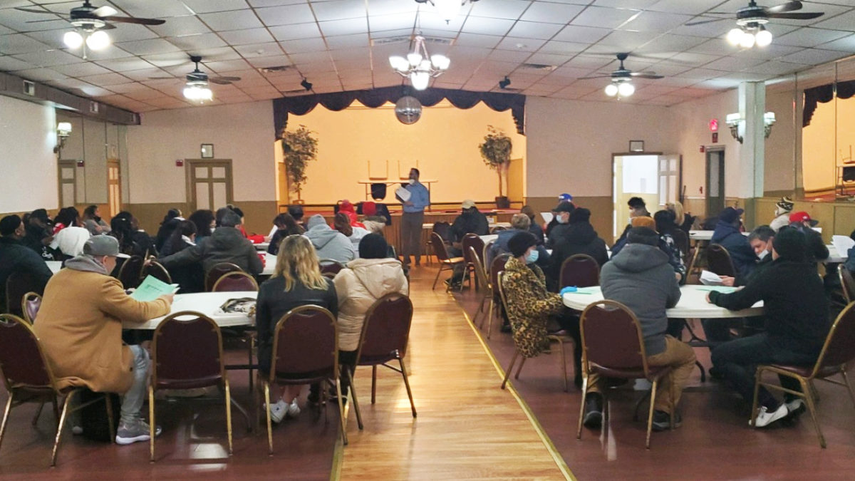 Members listening to Director of Collective Bargaining, Dan Ross, at the Dietz & Watson ratification meeting on 2/27/22.