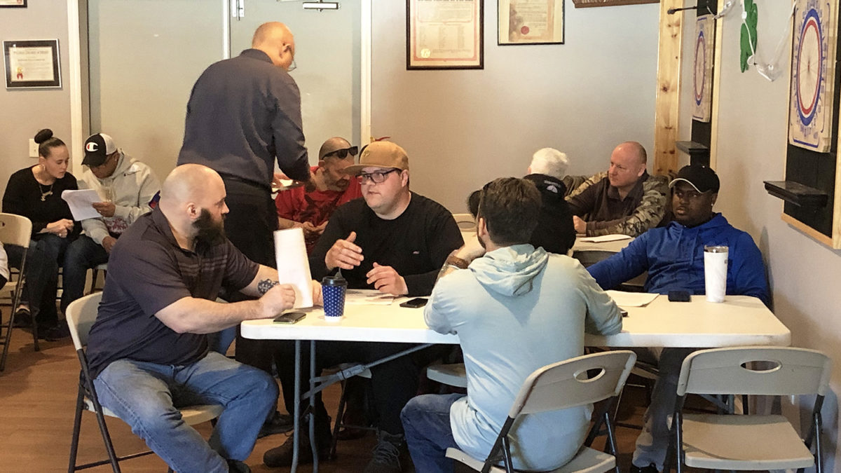 Snow's/Bumble Bee members learning about their new contract before the vote on 3/19/22.