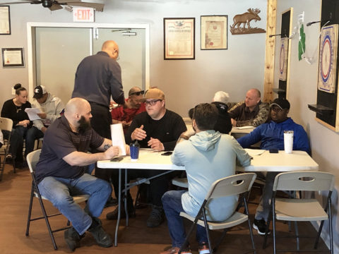 Snow's/Bumble Bee members learning about their new contract before the vote on 3/19/22.