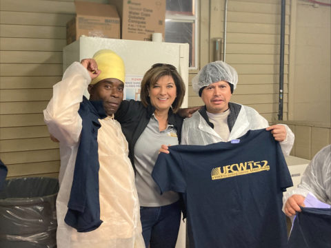 Assistant Director of Collective Bargaining Lisa Sanders with Shop Steward James Grant and another member at the Case's Pork Roll ratification meeting on 4/28/22.