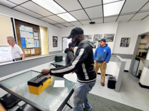A member voting at the George Wells ratification vote on 5/11/22.