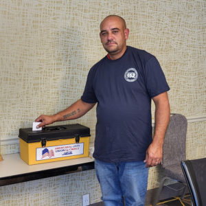 A member voting at the 10/6/22 meeting.