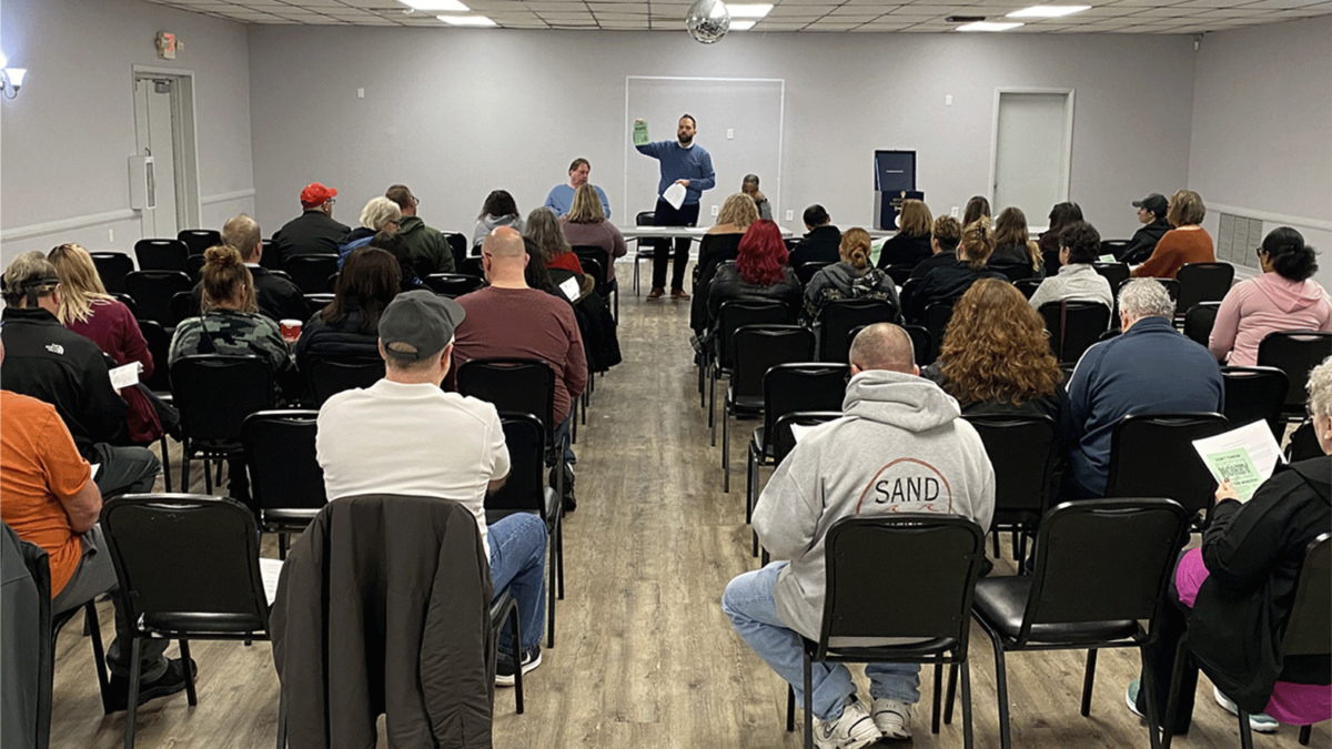 Daniel Ross, Jr. at a meeting