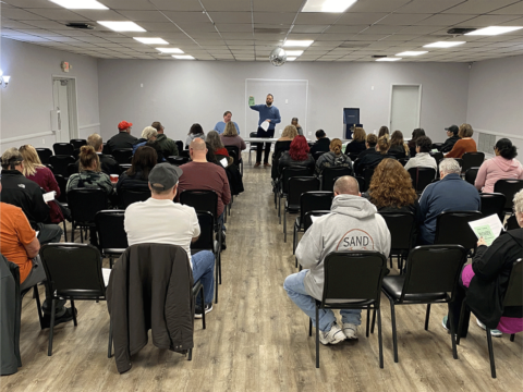 Daniel Ross, Jr. at a meeting
